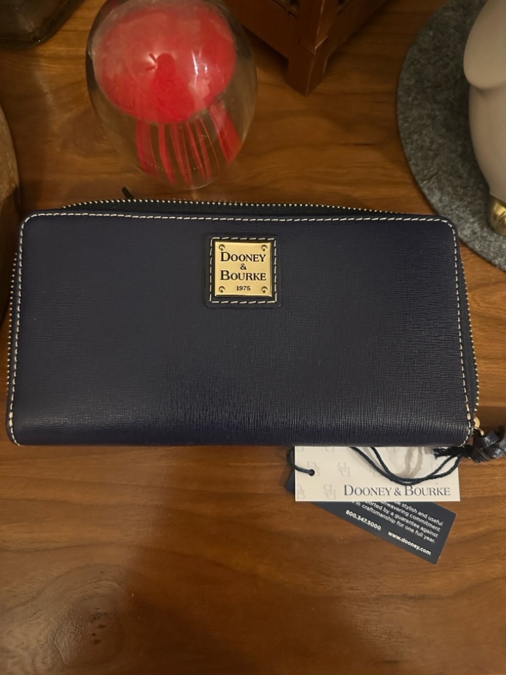 Dooney & Bourke Navy Zip-Around Continental Wallet with Gold Plaque